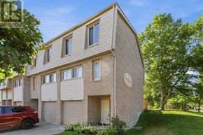 London North (North I) townhouse for rent - A modern house with a red car parked in front.