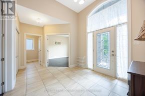 Ottawa apartment for rent - A spacious room with a sliding glass door leading to a balcony.