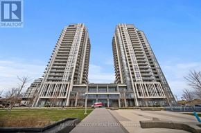 Toronto (Islington-City Centre West) condo for rent - Two tall buildings with balconies are shown in the image.