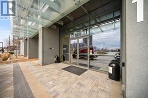 Toronto (Islington-City Centre West) condo for rent - The entrance to a building with a glass door and a sign that reads "15 ZORRA 17".