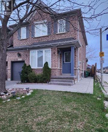 Mississauga (Churchill Meadows) apartment for rent - A house with a blue door and a sign that says 20.