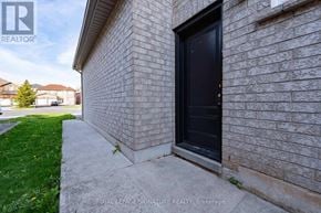 Mississauga (Creditview) multi-family for rent - A house with a black door and a sign that says Royal LePage Signature Realty, Brokerage.