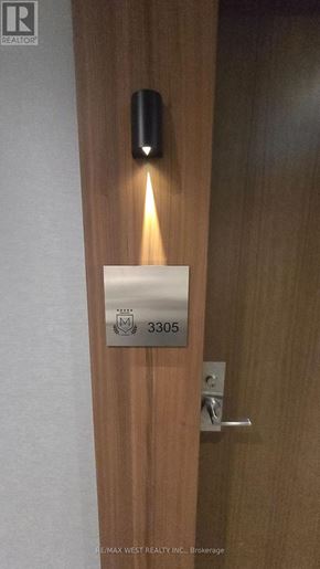 Toronto (South Parkdale) condo for rent - A door with a sign that says 3305 on it.