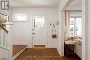 Toronto (Weston) apartment for rent - A white door is in the middle of a hallway.