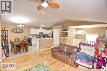 Windsor apartment for rent - A living room with a brown leather couch and a ceiling fan.