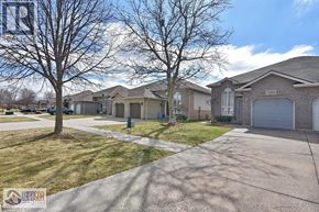 Windsor apartment for rent - A residential area with houses and bare trees.