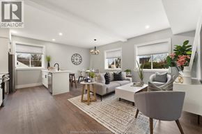 Essex apartment for rent - A well-lit, modern living room with a grey sofa and a wooden coffee table.
