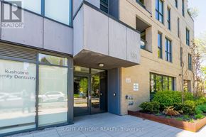 Toronto (Dufferin Grove) condo for rent - The front of a building with a glass door and windows.
