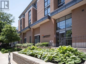 Toronto (Moss Park) condo for rent - A building with the number 132 on it.