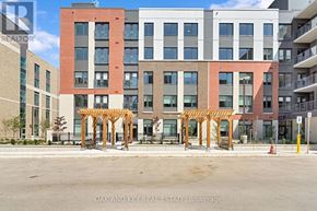 London East (East K) condo for rent - A building with a sign that says Oak and Key Real Estate Brokerage.