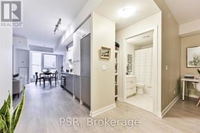 Toronto (Waterfront Communities) condo for rent - A well-lit, spacious kitchen and dining area with a breakfast bar.