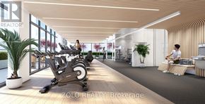 Toronto (Willowdale East) condo for rent - A modern gym with wooden floors and a variety of exercise equipment.