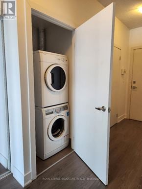 Toronto (Banbury-Don Mills) condo for rent - A white door is open to reveal a washer and dryer in a small room.