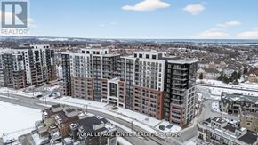 Clarington (Bowmanville) condo for rent - A real estate company logo is displayed on a snowy landscape with apartment buildings.