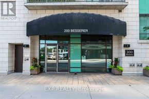 Ottawa condo for rent - The front of a building with a black awning and the words "200 Besserer" written on it.