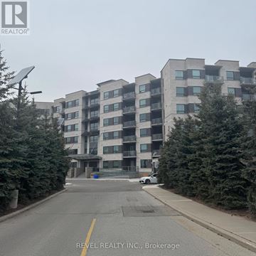 Milton (Om Old Milton) condo for rent - A building with the text REVEL REALTY N.C., Brokerage in front of it.