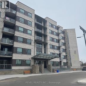 Milton (Om Old Milton) condo for rent - A building with the words "green life" on the side.