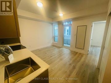 Oakville (Jm Joshua Meadows) condo for rent - A kitchen with a sink and a window.
