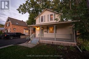 Burlington (Brant) apartment for rent - A house with a car parked in front of it.