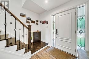 Richmond Hill (South Richvale) apartment for rent - A hallway with a staircase and a door.