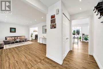 Richmond Hill (South Richvale) apartment for rent - A spacious living room with a grey sofa and a coffee table.