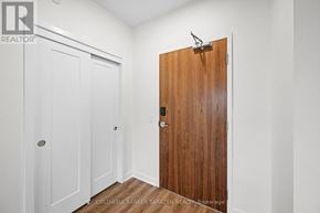 Arnprior condo for rent - A room with a white door and a brown door.