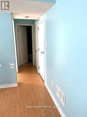 Toronto (Rouge) apartment for rent - A hallway with a door on the left and a door on the right.
