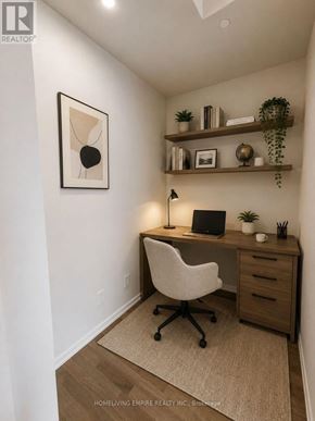 Toronto (Clairlea-Birchmount) condo for rent - A home office with a desk, chair, and shelves with decorative items.