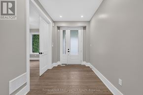 Innisfil (Alcona) apartment for rent - A hallway with a door and a window.