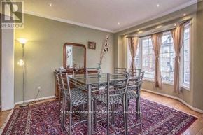 Markham (Cornell) apartment for rent - A dining room with a table and chairs.