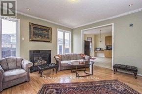 Markham (Cornell) apartment for rent - A living room with a fireplace and a painting on the wall.