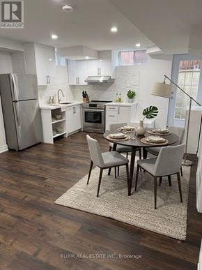 Burlington (Alton) apartment for rent - A modern kitchen with a dining table set for two.