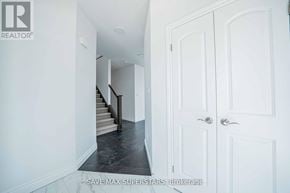 London South (South W) apartment for rent - A hallway with a staircase and two doors.