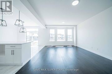 London South (South W) apartment for rent - A spacious room with a kitchen area and a large window.