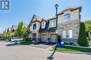 Hamilton (Mewburn) townhouse for rent - A house with a RE/MAX Realty Services Inc. brokerage logo.