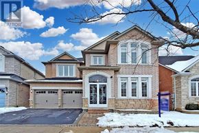 Richmond Hill (Jefferson) apartment for rent - A large brick house with a blue sign in front.