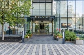 Toronto (Bay Street Corridor) condo for rent - The entrance to a building with the name "5751 Joseph" on the sign above the door.