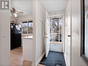 Niagara Falls (Stamford) townhouse for rent - A room with a doorway leading to a balcony.