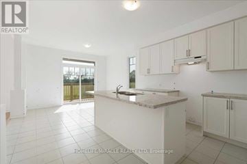 Loyalist (Bath) apartment for rent - A white kitchen with a sink and cabinets.