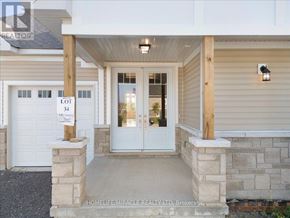 Loyalist (Bath) apartment for rent - The front entrance of a building with a sign that says "Lot 34".