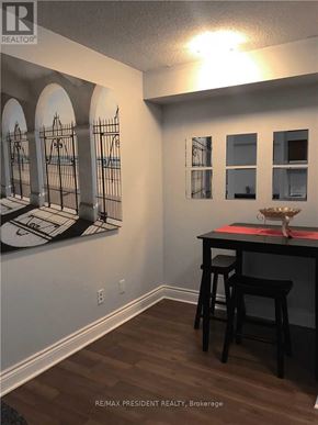 Mississauga (City Centre) condo for rent - A dining room with a table and chairs.