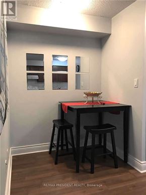 Mississauga (City Centre) condo for rent - A small black table with two stools in a room.