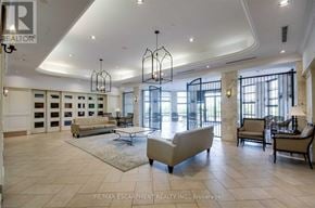 Toronto (West Humber-Clairville) condo for rent - A spacious living room with a large couch and a rug.