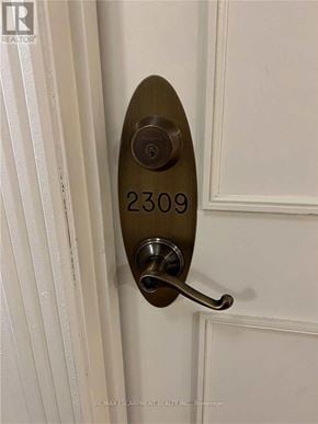 Toronto (West Humber-Clairville) condo for rent - A door handle with the number 2309 on it.