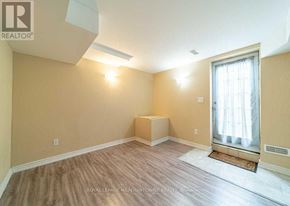 Milton (Be Beaty) apartment for rent - A room with a window and a radiator on the wall.