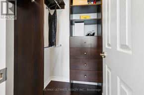 Toronto (Edenbridge-Humber Valley) condo for rent - A hallway with a white door and a brown door.