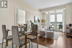 Toronto (Edenbridge-Humber Valley) condo for rent - A dining room with a glass table and chairs.