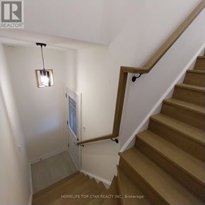 Markham (Cornell) apartment for rent - A staircase with a light hanging above it.