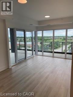 Brantford apartment for rent - A room with a view of the outside through large windows.