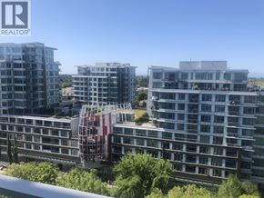 Richmond apartment for rent - A view of a cityscape with buildings and trees.